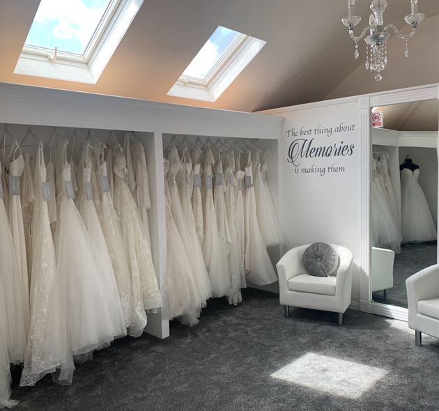 Rows of wedding dresses inside Gems Bridal Wear in Newport, Isle of Wight