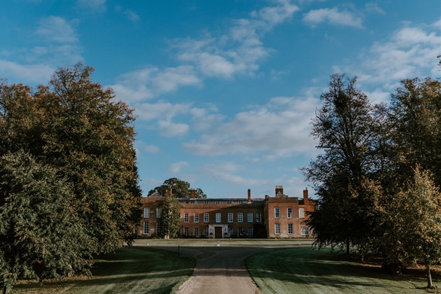 Long view down driveway of luxury wedding venue Braxted Park