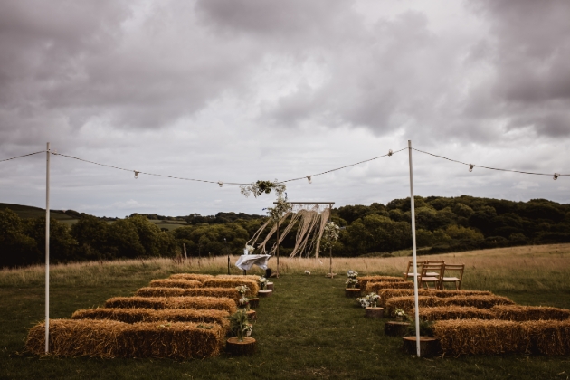 al fresco wedding set up haybales and chairs cloudy day