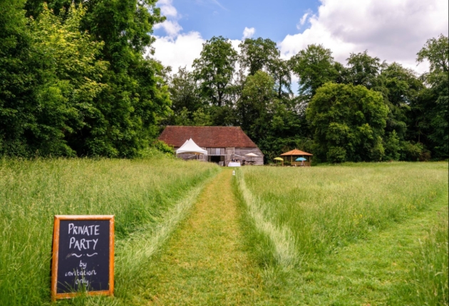 Gilbert White & The Oates Collections, barn in field surrounded by trees