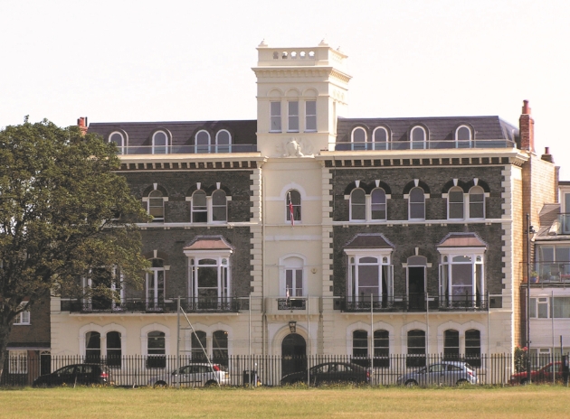 Royal Naval Club & Royal Albert Yacht Club, white and grey building sat on main road