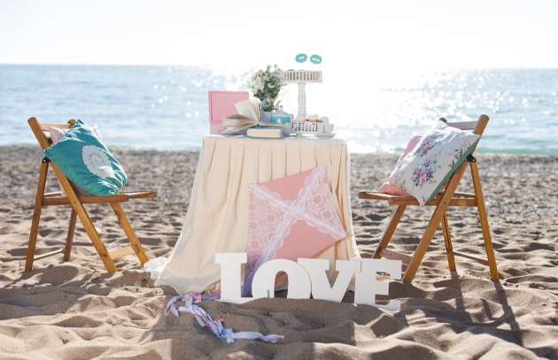 sweetheart couples table on beach