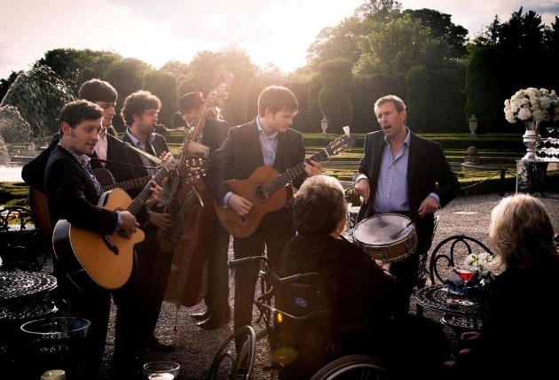 band in gardens playing to guests 