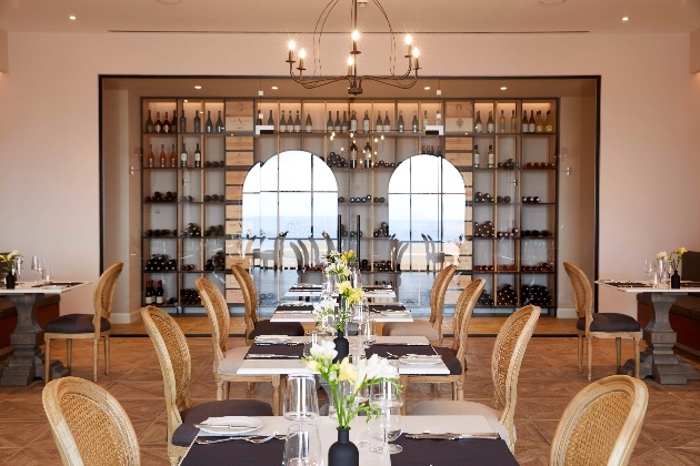 restaurant view with wall of wine as part of decor