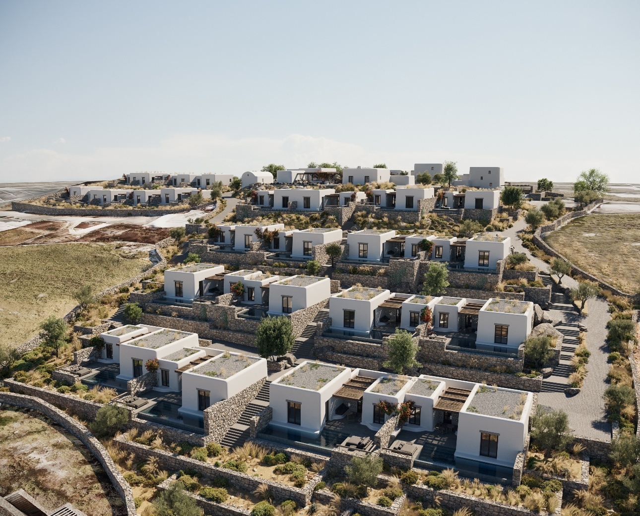 aerial view of multiple suites and villas in the hillside 