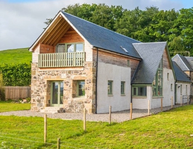 large white and brick barn conversion rolling hills