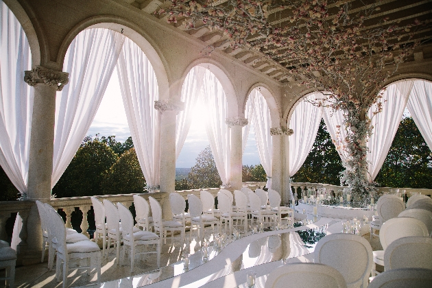 outdoor wedding on balcony flower tree floor to ceiling