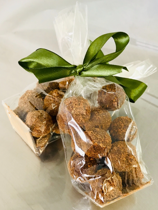 chocolate truffles in a bag tied with ribbon