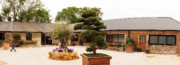 courtyard new barns and tiles and flowers