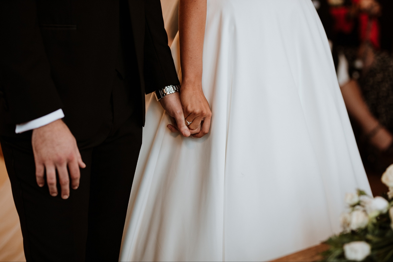 Couple holding hands