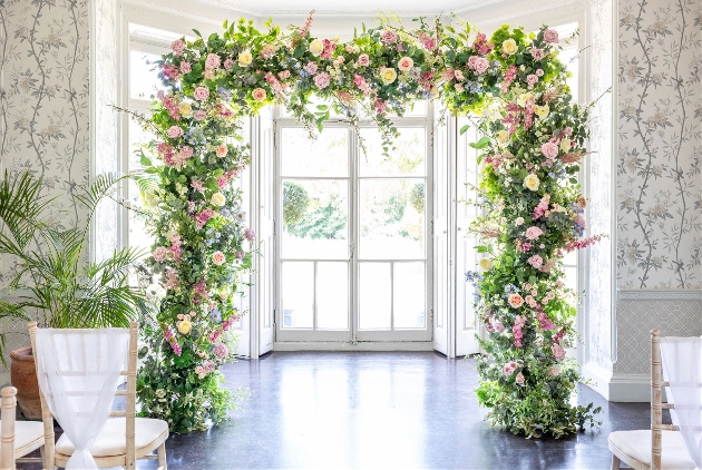 floral arch around ceremony area