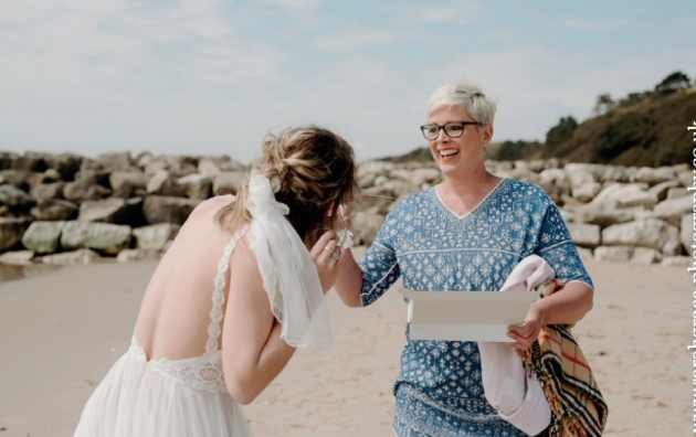 Tasha Mae at a beach wedding