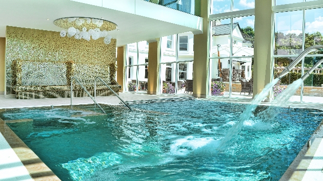 jacuzzi in spa with long glass windows