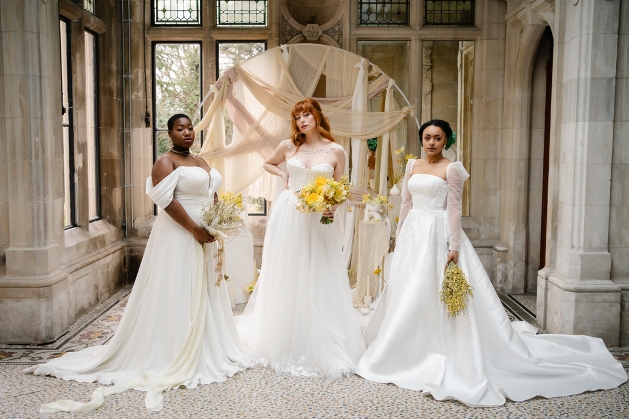 three models in dresses