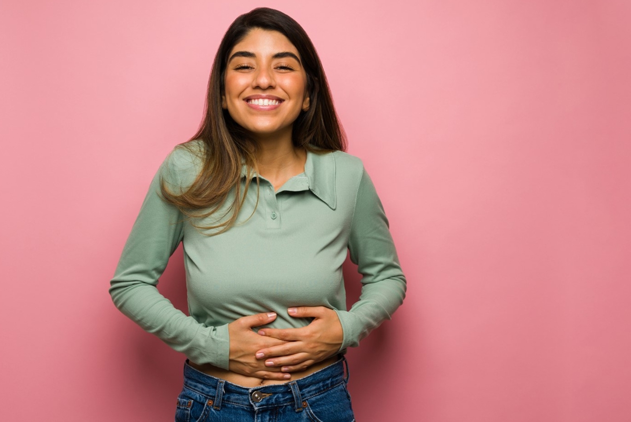 woman with hands on her belly