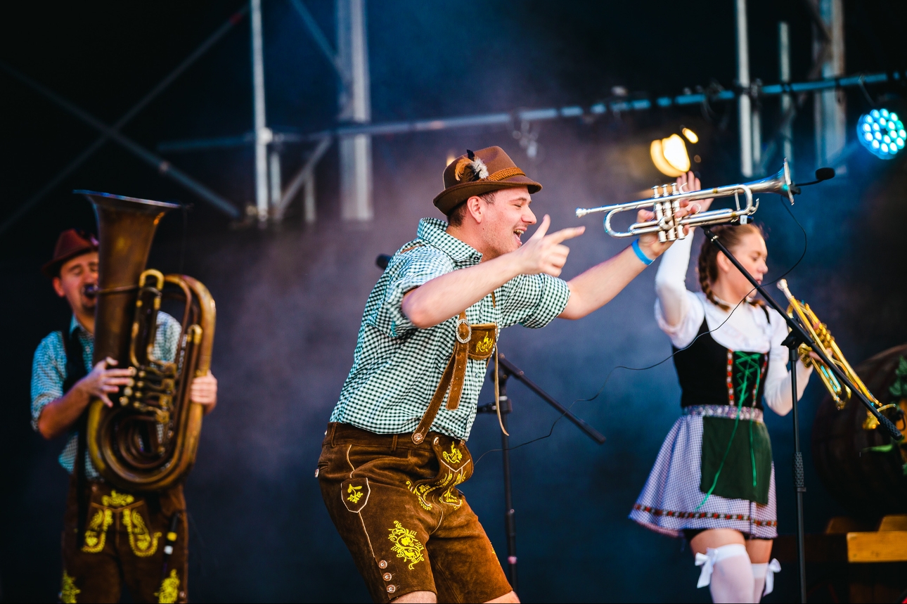 band dressed in dutch attire on stage 