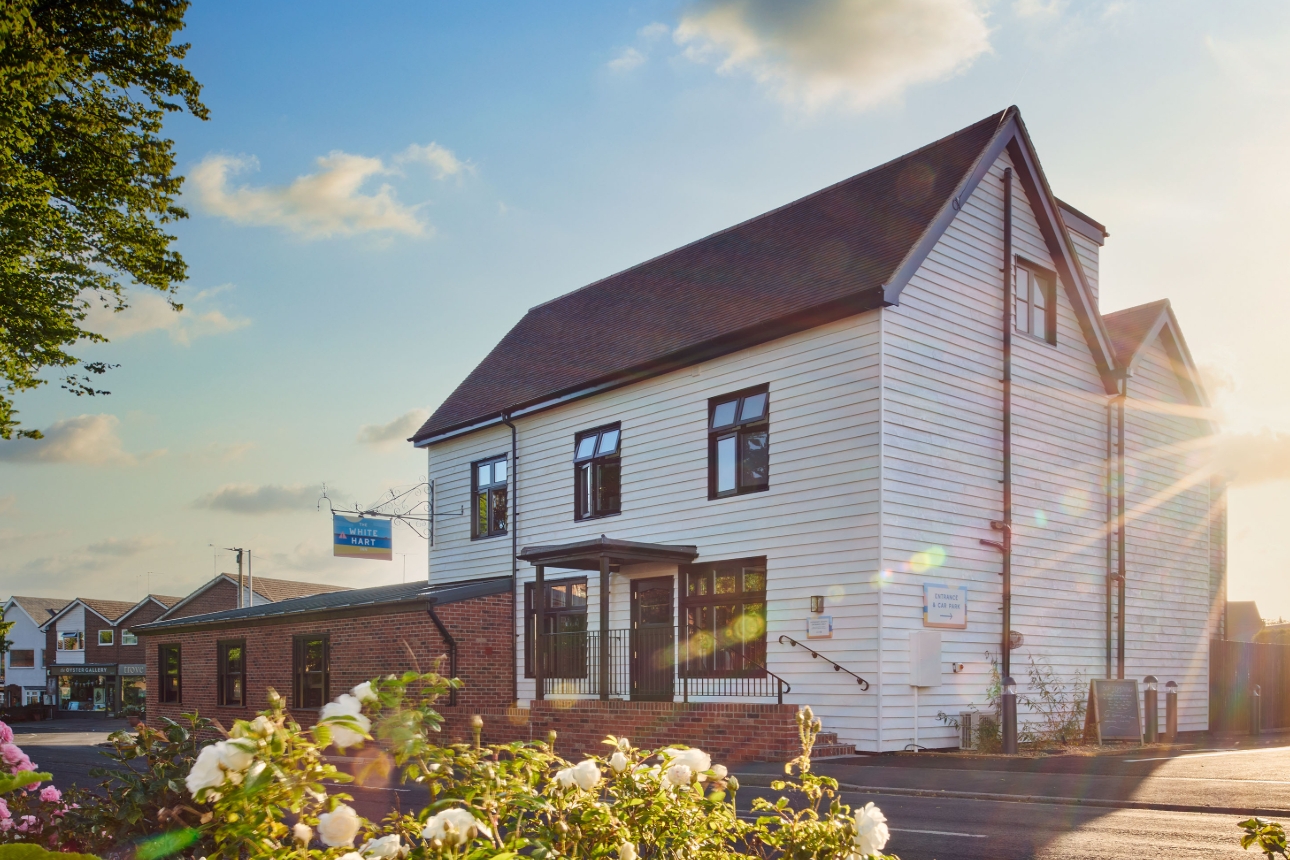 image of white building taken at sunset