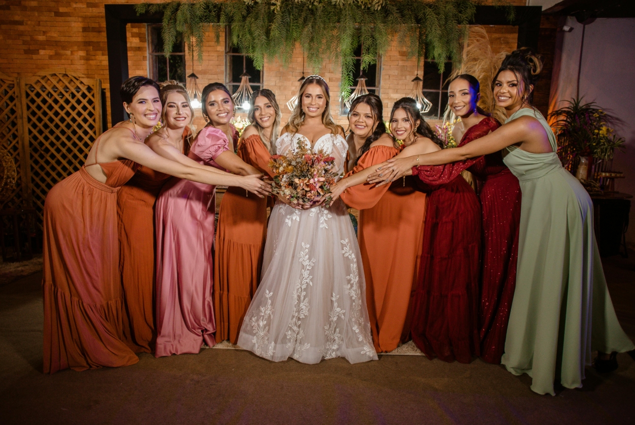 bridesmaids in different coloured dresses