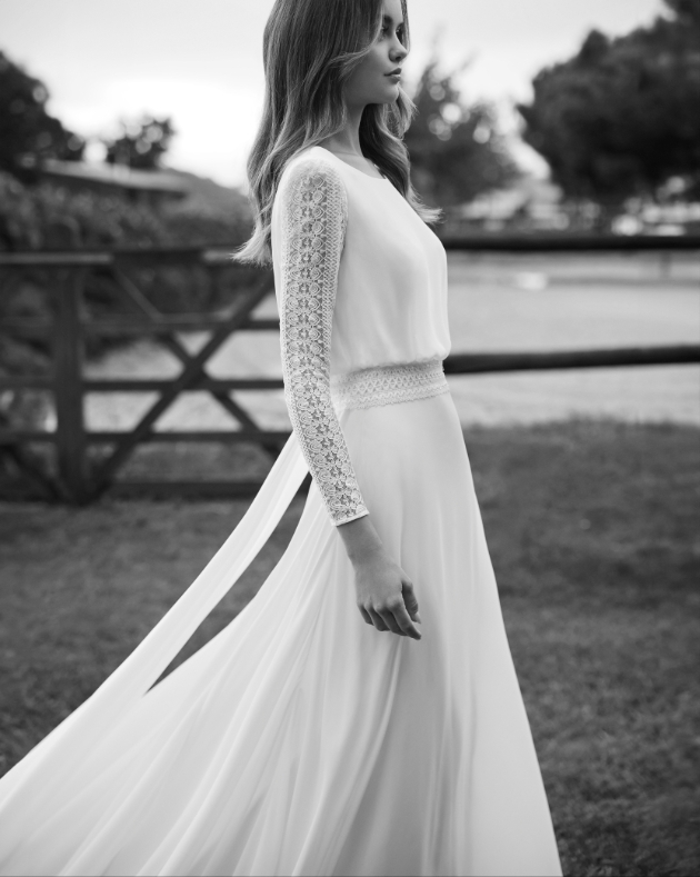model in boho-style dress, crochet sleeves and belt, soft fabric, flowy
