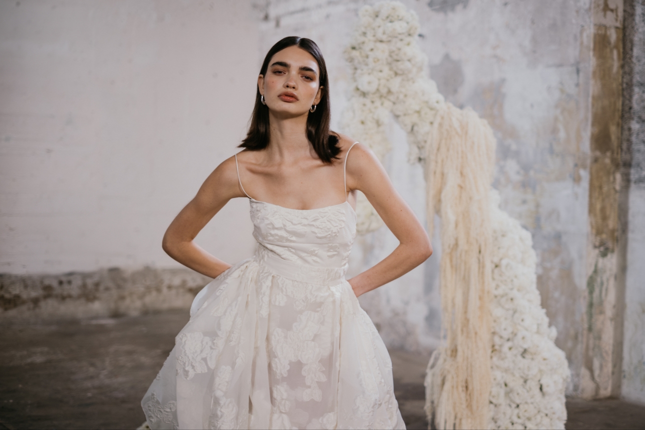 model in layered dress with lace flower applique thin spaghetti straps