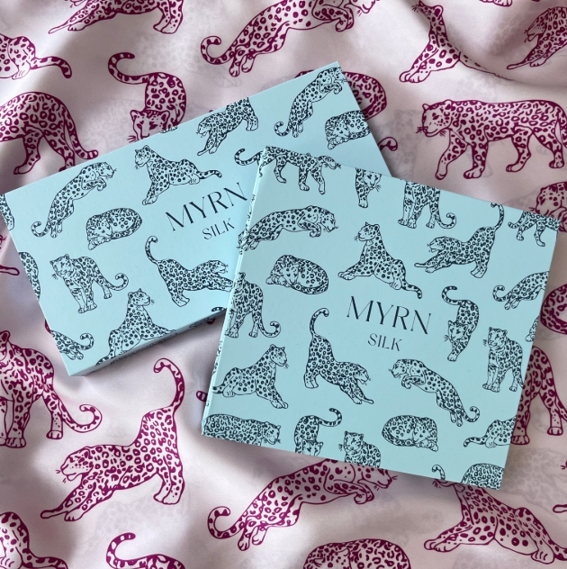 MYRN branded boxes on silk backs
